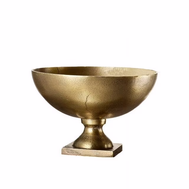 gold colored pedestal bowl